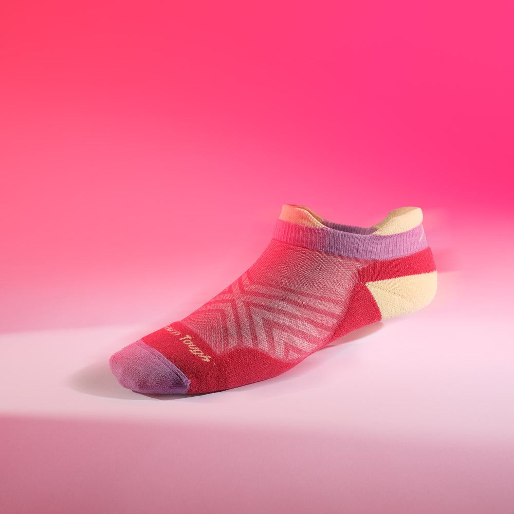 1039 ultra lightweight no show run sock in cranberry on pink background 