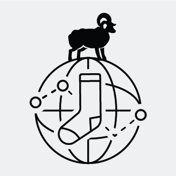 A sheep standing on a globe to illustrate how we source our merino wool