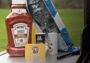 Darn Tough Gift Card next to some condiments and chips