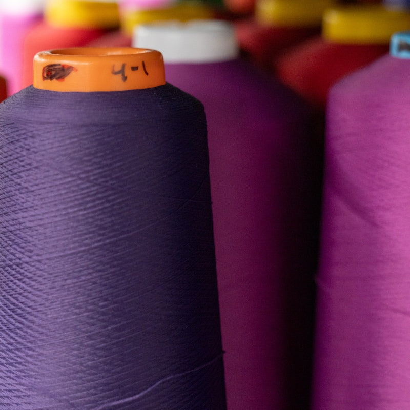 Rows of sock knitting yarn from above