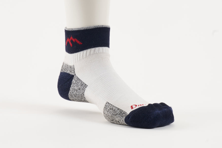 The original Darn Tough Run Quarter sock, in white and blue with red accents