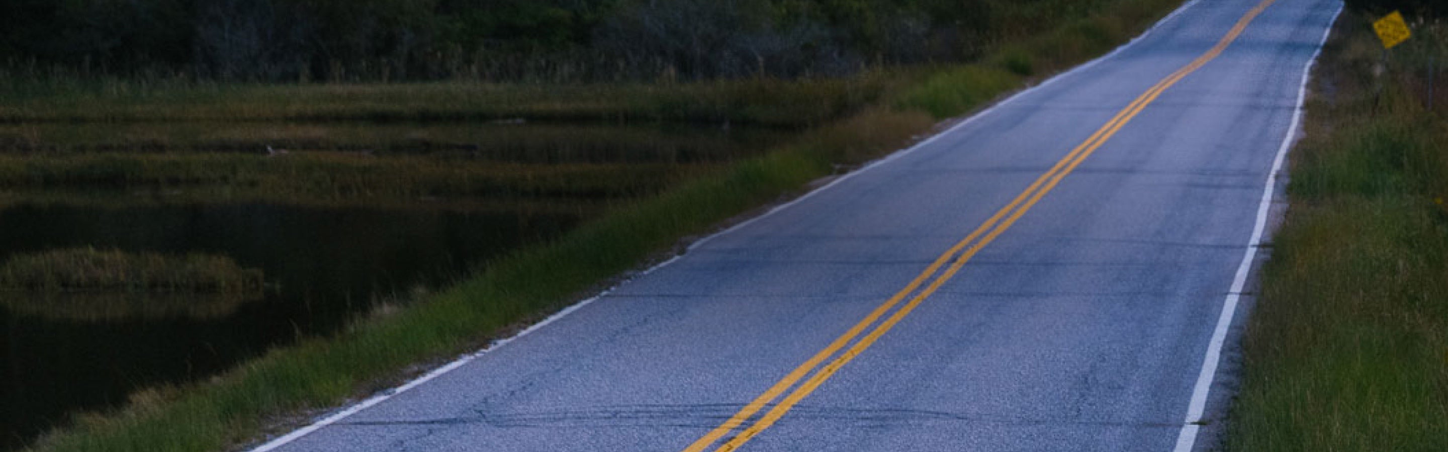 A long road heading into the distance, perfect for road running