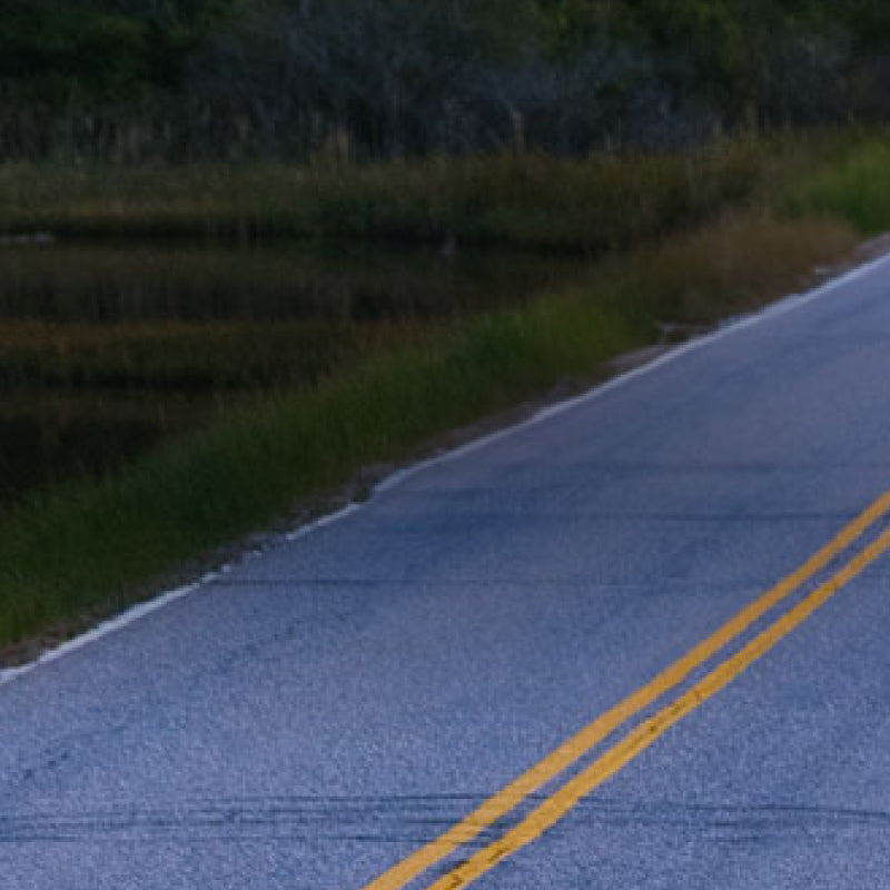 A long road heading into the distance, perfect for road running