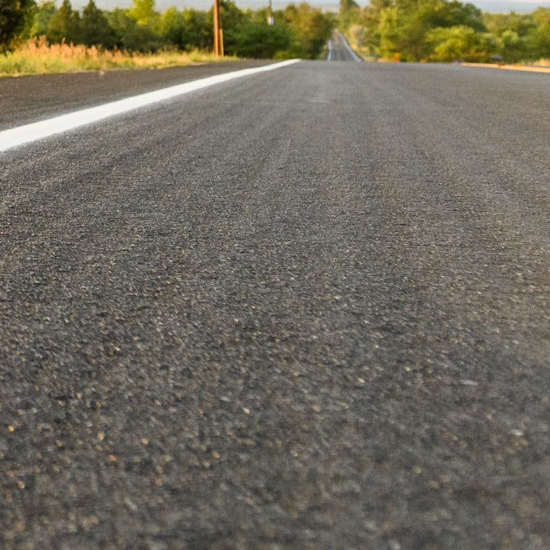 A low angle view of the pavement, the ideal road for running