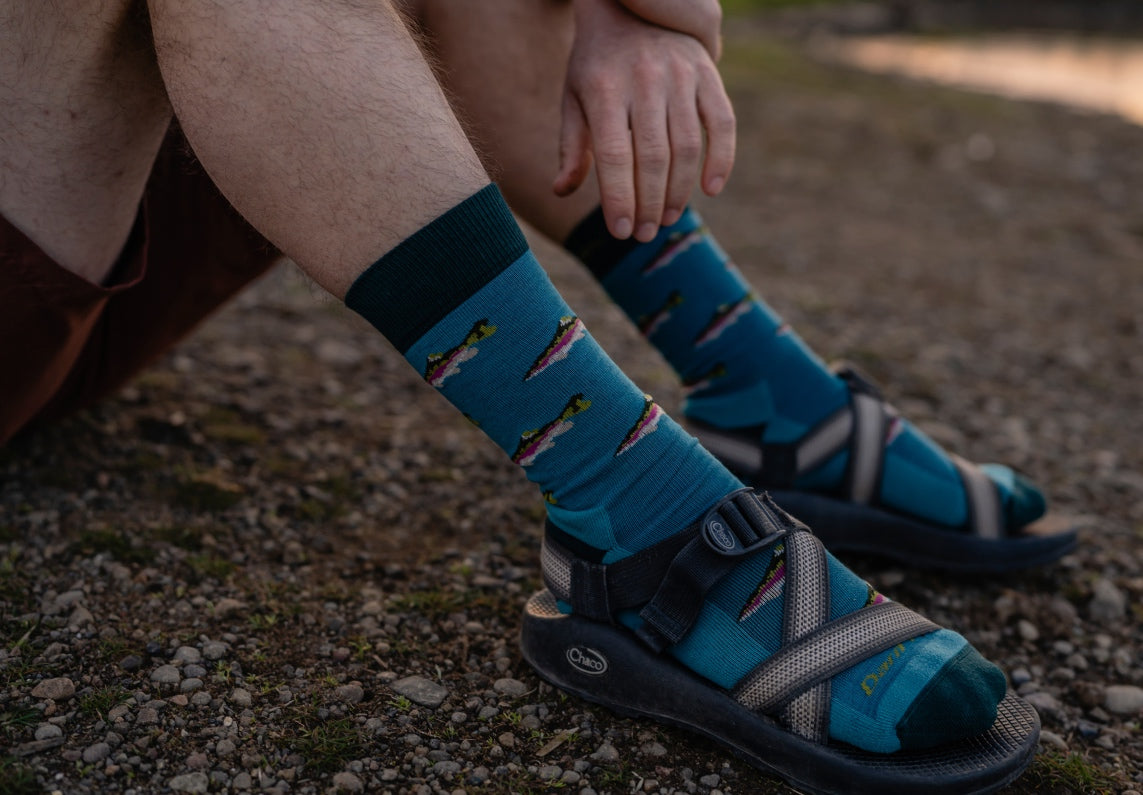 Shop Fun Socks for Dad - feet in blue socks with fish on them
