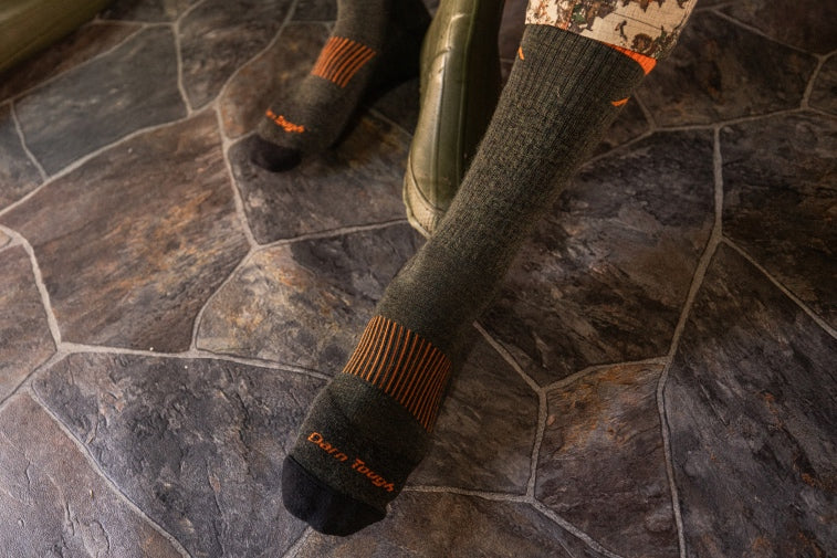 Shop Men's Hunting socks - feet wearing green hunting socks 