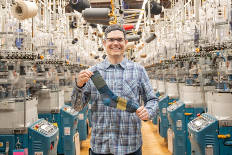Shop men's staff picks - Darn Tough employee holding up his favorite sock