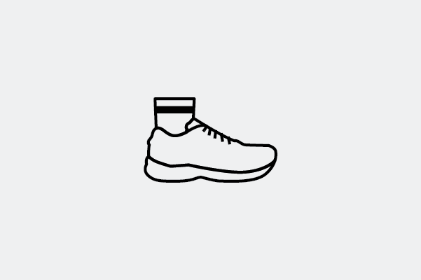 Illustration of a foot wearing Merino Wool socks and boots