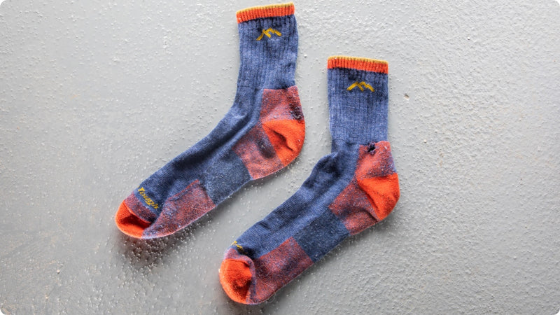 A pair of the 1466 hiker micro crew that's come back through the warranty program