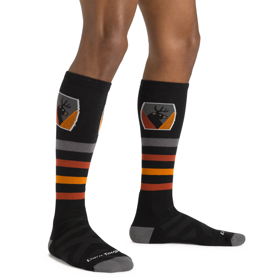 Men's thermolite beer (deer and bear) badge over the calf Ski and Snowboard sock in black with orange/gray/red stripes