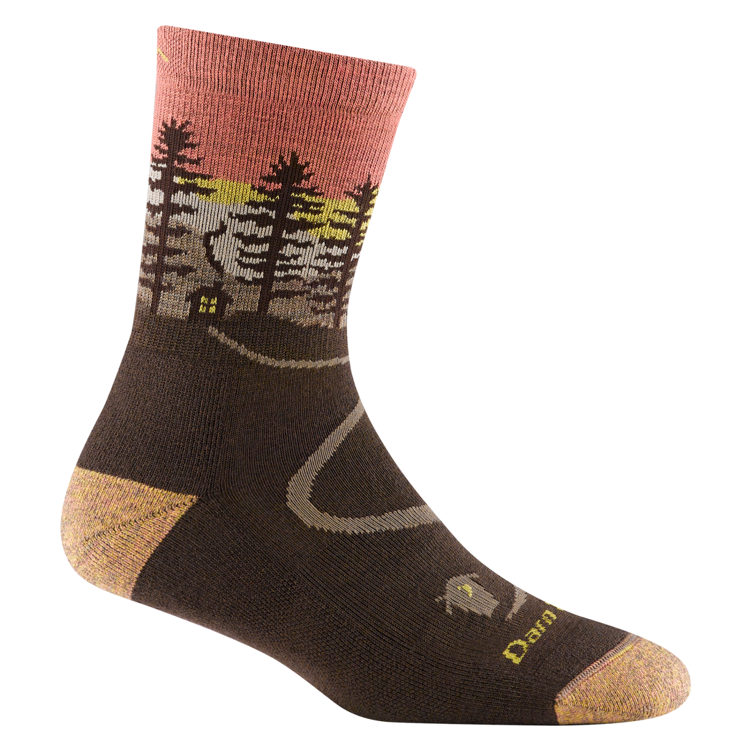 5013 women's northwoods micro crew hiking sock in earth with a tan toe/heel accents and cabin and tree design on the ankle