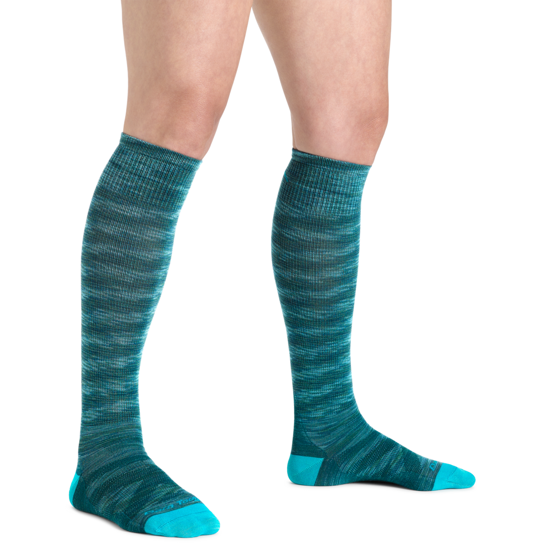 Woman wearing Women's RFL Over-the-Calf Ultra-Lightweight Ski and Snowboard sock in Neptune