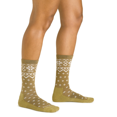 Close up studio shot of model wearing women's shetland crew lightweight lifestyle sock in honey yellow