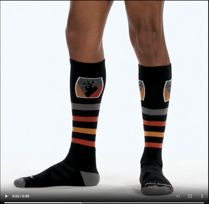model walking in the 8045 beer badge over the calf in black