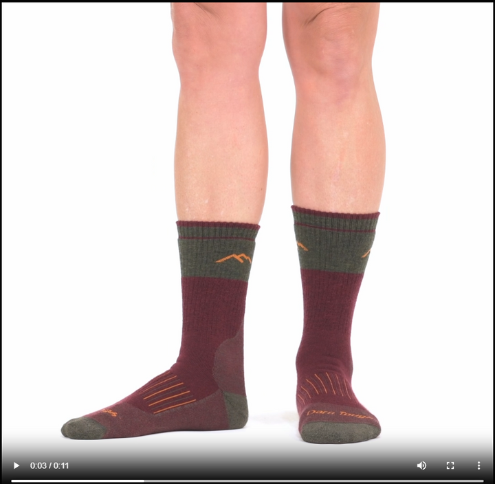 Model walking in the 2104 hunting boot sock in ember