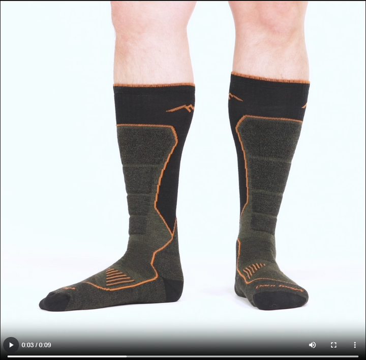 Model walking in the 2116 hunting over the calf sock in forest