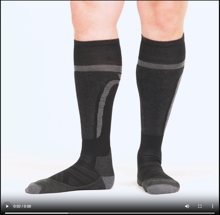 Model walking in the 8053 Edge over the calf sock in black
