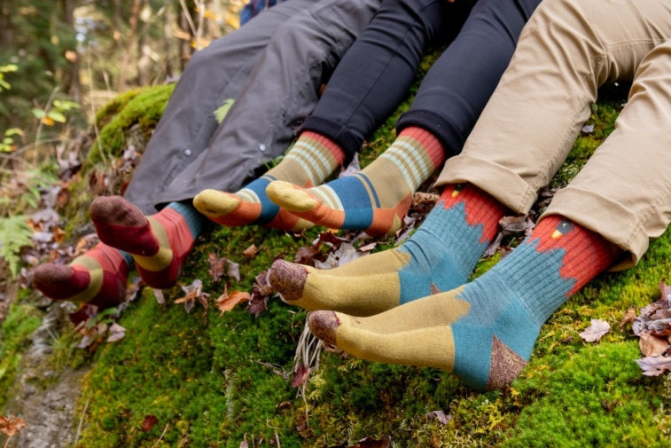 Shop Sock Gift Sets - Three pairs of feet wearing Darn Tough socks