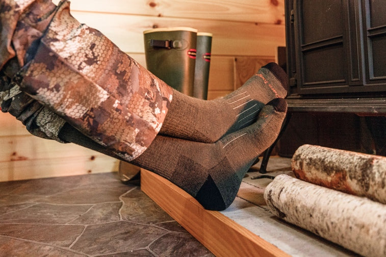 Shop Warm Socks - feet wearing super warm merino wool hunting socks