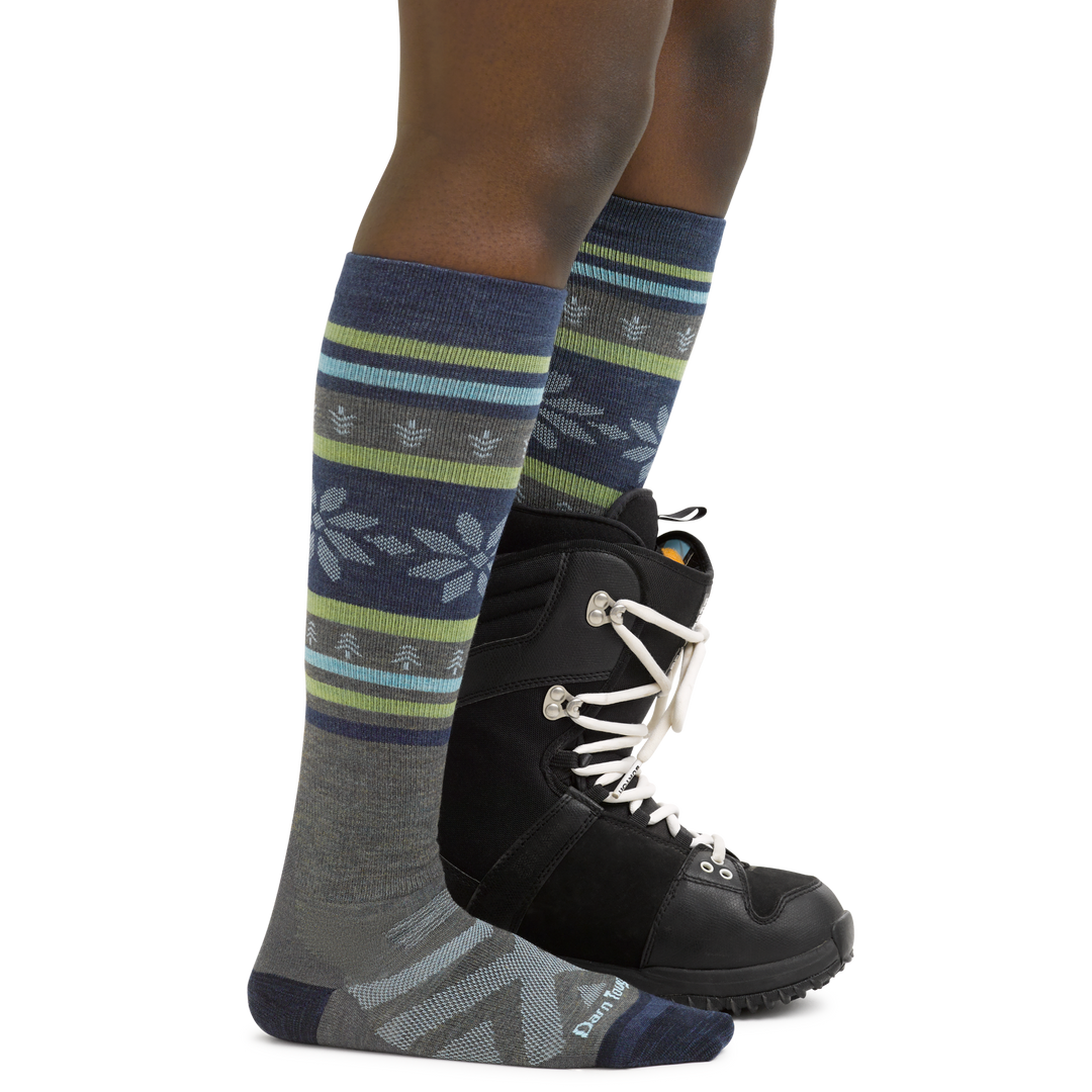 Women's Alpine Ski and Snowboard Socks in Forest on foot with snowboard boots