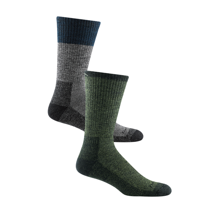 1982 men's nomad boot hiking sock in color moss green with dark green toe/heel accents and darn tough signature on forefoot, 1981 men's scout boot hiking sock in color denim blue with black toe/heel accents and navy blue color block around calf