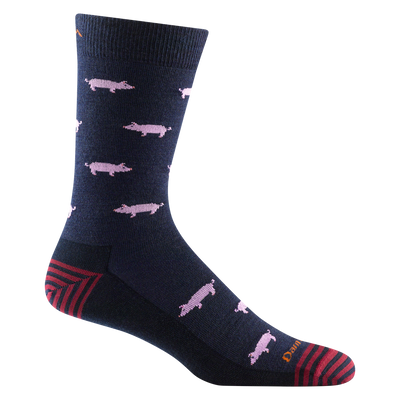 Reverse side of men's truffle hog crew lifestyle sock in color navy with orange darn tough signature on forefoot