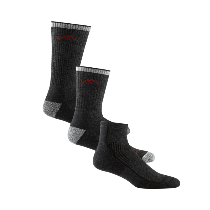 3 pack bundle shot of the men's boot, micro crew, and quarter height hiking socks all in the color black