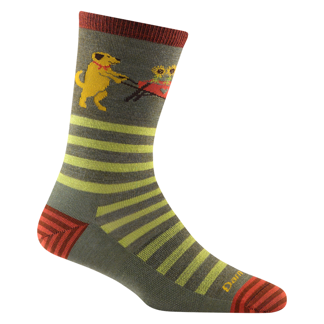 6037 women's animal haus crew lifestyle sock in herb with a dog waking a wagon full of sunflowers
