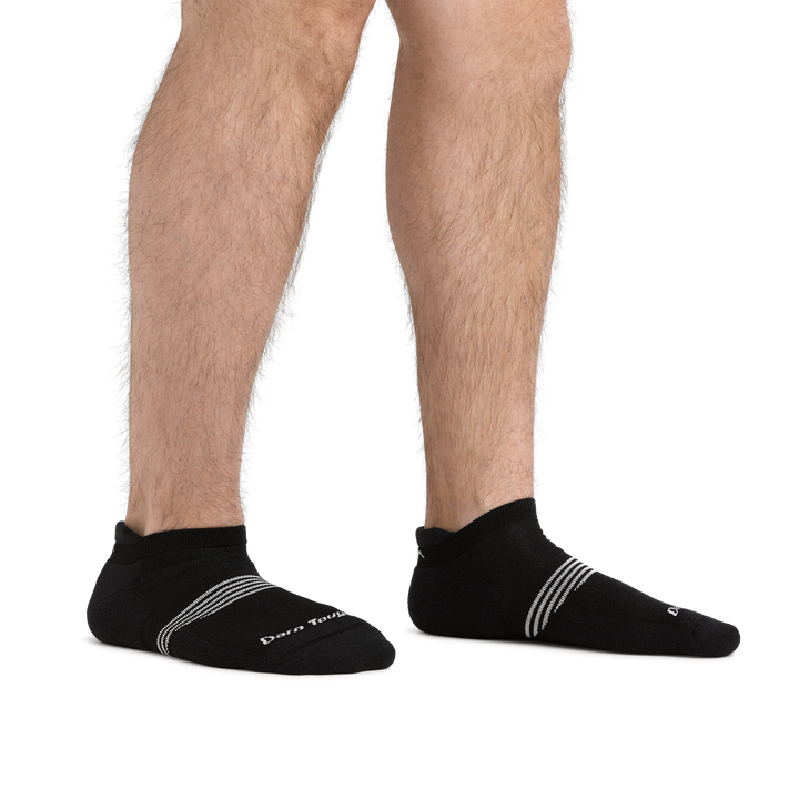 Man standing barefoot wearing Element No Show Tab Lightweight Athletic Socks with Cushion in Black