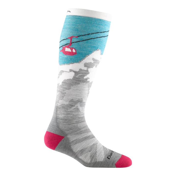 studio shot of women's yeti midweight ski and snowboard socks. they feature grey and white mountains with a teal sky, pink gondola, and pink toe and heel.